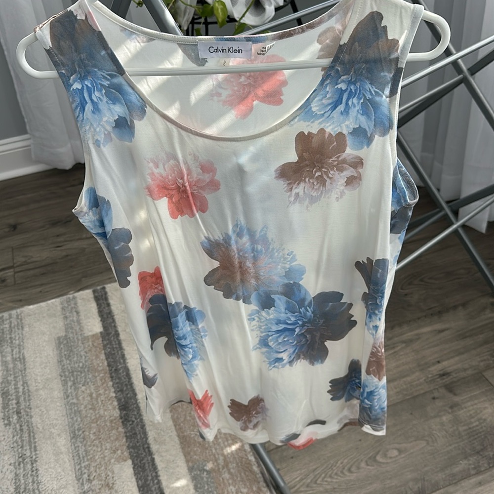 Calvin Klein woman’s short sleeve shirt.